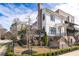 Charming exterior elevation featuring a brick and white facade with landscaped yard at 1311 English Nw St, Atlanta, GA 30318