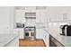 Well-equipped kitchen with stainless steel appliances and a tile backsplash at 1311 English Nw St, Atlanta, GA 30318