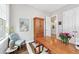 Another view of the bright home office space with desk, chair, and hardwood floors at 1311 English Nw St, Atlanta, GA 30318