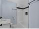 Modern bathroom featuring a tub, white tiles, and updated fixtures at 1931 Selwyn Dr, Decatur, GA 30035