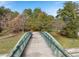 Overhead view of the Silver Comet Trail bridge over a road and a tree-filled background at 204 Oak View Ln, Dallas, GA 30157