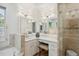 Bright bathroom with vanity, soaking tub, and natural light at 560 Collier Nw Rd, Atlanta, GA 30318