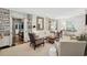 Bright and airy living room featuring built-in shelving and an open layout, perfect for entertaining at 560 Collier Nw Rd, Atlanta, GA 30318