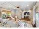 Bright living room showcasing coffered ceilings, comfortable seating, and a large television at 560 Collier Nw Rd, Atlanta, GA 30318