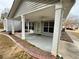 Covered patio with ceiling fans, concrete flooring, and view of the backyard at 1854 Brittlebank Ln, Lawrenceville, GA 30043