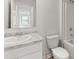 Bathroom featuring a sink with a granite counter, tub, and shower at 206 Oak View Ln, Dallas, GA 30157