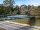 Silver Comet Trail bridge stretches across a highway surrounded by lush green trees and blue sky at 206 Oak View Ln, Dallas, GA 30157