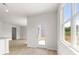Bright dining area with hardwood floors and a view through a glass door at 206 Oak View Ln, Dallas, GA 30157