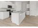 Bright kitchen features granite countertops, a stainless steel microwave, and a functional island at 206 Oak View Ln, Dallas, GA 30157