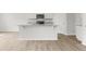 Bright kitchen features granite countertops, a stainless steel microwave, and a functional island at 206 Oak View Ln, Dallas, GA 30157