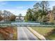 The Silver Comet Trail pedestrian bridge overlooking the neighborhood street at 206 Oak View Ln, Dallas, GA 30157