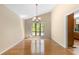 Dining room with hard wood flooring and view to trees at 2235 Six Branches Dr, Roswell, GA 30076