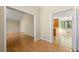 Bright living space with beautiful hardwood floors, and an open layout to the kitchen and dining area at 2235 Six Branches Dr, Roswell, GA 30076
