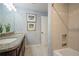 Bright bathroom features a granite countertop, tiled shower, and decorative accents at 4084 Columns Dr, Marietta, GA 30067