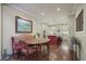 Breakfast nook is adjacent to a kitchen with updated appliances and red island at 4084 Columns Dr, Marietta, GA 30067