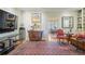 Cozy living room offers built-in shelving and a vintage rug and furniture at 4084 Columns Dr, Marietta, GA 30067