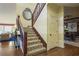 Beautiful staircase with patterned carpet leading to upper level of the home at 4084 Columns Dr, Marietta, GA 30067