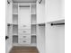 Walk-in closet with custom shelves and drawers for optimal organization at 1084 Brookglynn Trce, Decatur, GA 30032