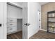 Modern closet with built-in drawers and shelving at 1084 Brookglynn Trce, Decatur, GA 30032