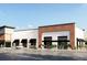 Commercial building with modern architecture, featuring large glass windows, awnings, and manicured landscaping at 1084 Brookglynn Trce, Decatur, GA 30032