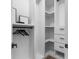 Well-organized walk-in closet with custom shelves and hanging space at 1084 Brookglynn Trce, Decatur, GA 30032