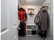 Walk-in closet with organized shelving, gray carpet, and ample space for clothing and accessories at 3655 Habersham Ne Rd # 344, Atlanta, GA 30305