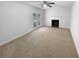 Bright living room with a fireplace and french doors leading to the exterior at 5920 Rock Rd, Union City, GA 30291