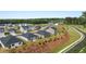 Aerial view of a residential community with new homes, landscaping, and well-planned streets at 8601 Secretariat Dr, Lithonia, GA 30058