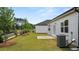 A backyard featuring a lawn and patio, offering a serene outdoor retreat at 8601 Secretariat Dr, Lithonia, GA 30058