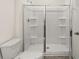 Bathroom featuring a walk-in shower, toilet and ample room at 8601 Secretariat Dr, Lithonia, GA 30058