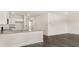 Open-concept kitchen with a breakfast bar, granite counters and abundant natural light at 8601 Secretariat Dr, Lithonia, GA 30058