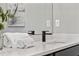 A white counter in the bathroom with towels and a modern faucet at 2150 Tidwell Ln # 5, Atlanta, GA 30318