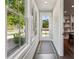 Hallway with natural light, windows, and a decorative rug at 2150 Tidwell Ln # 5, Atlanta, GA 30318