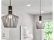 Modern kitchen lighting featuring black pendant lights at 2150 Tidwell Ln # 5, Atlanta, GA 30318