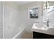 Bathroom featuring a tub, vanity, and tiled wall at 3930 Buck Rd, Powder Springs, GA 30127