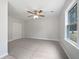 An empty bedroom with neutral walls, carpet, a ceiling fan, and a closet at 3930 Buck Rd, Powder Springs, GA 30127