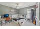 Spacious bedroom features basketball hoop, guitar, and personal touches at 807 Plaintain Dr, Woodstock, GA 30188