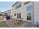 Brick patio with outdoor dining area and grill, perfect for entertaining guests at 807 Plaintain Dr, Woodstock, GA 30188