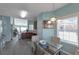 Cozy dining area with a glass table, lots of natural light and easy kitchen access at 2555 Flat Shoals Rd # 1705, Atlanta, GA 30349