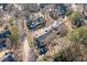 Aerial view showcasing the residential neighborhood surrounded by lush greenery and convenient parking spaces at 6420 Magnolia Way, Morrow, GA 30260