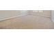 A spacious, carpeted bedroom provides a blank canvas for your personal touch at 6420 Magnolia Way, Morrow, GA 30260