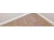 Close up on carpeting with neutral tones and white baseboards at 6420 Magnolia Way, Morrow, GA 30260