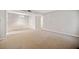 Large dining room featuring neutral carpet and paint at 6420 Magnolia Way, Morrow, GA 30260
