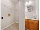 Functional laundry room conveniently located near the half bathroom at 6420 Magnolia Way, Morrow, GA 30260