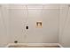 Functional laundry room with connections and storage shelf at 6420 Magnolia Way, Morrow, GA 30260