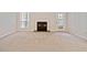 Open living room with fireplace and outdoor access at 6420 Magnolia Way, Morrow, GA 30260