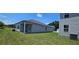 This single-Gathering home has a well-maintained lawn and a covered patio at 8591 Seabiscuit Rd, Lithonia, GA 30058