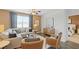 Open-concept living room with great natural light and modern decor at 8591 Seabiscuit Rd, Lithonia, GA 30058