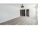 The home's primary bedroom features hardwood floors and neutral colors with a ceiling fan at 1180 Fleming St, Atlanta, GA 30080