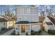 Beautiful home with a covered front porch, and complementing exterior colors at 1557 Alder Se Ct, Atlanta, GA 30317